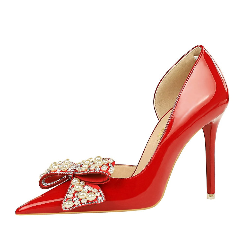 Pointed pearl rhinestone bow pumps