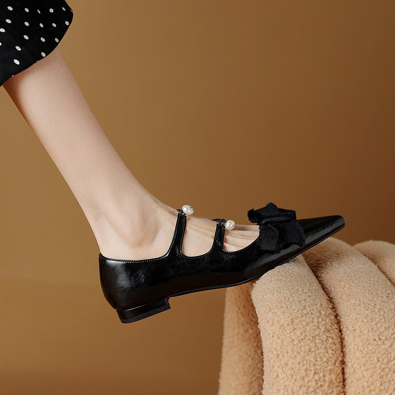 Pointed toe double strap bow flats